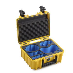 A yellow drone.case PP.117.Antigravity-A1 (B&W multipurpose case type 3000 Antigravity A1) with black latches, open to show custom blue foam inserts and egg crate foam lining in the lid.